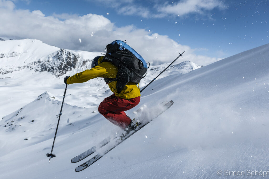 Skiing in the powder after a skinning the snow in Maja e Trekufinit.